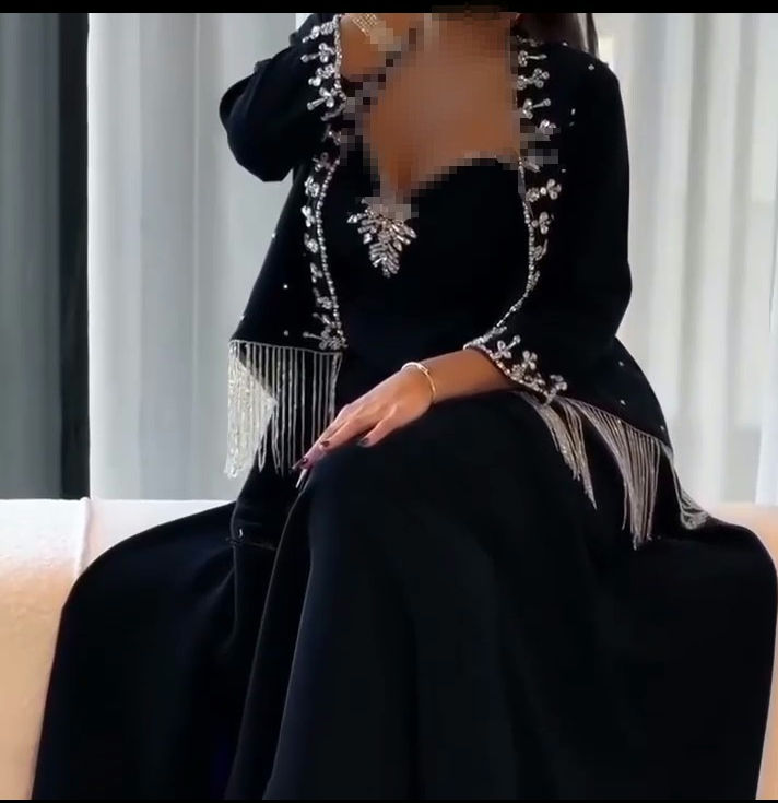 فستان سهرة أنيق باللون الأسود أجمل فساتين السعودية