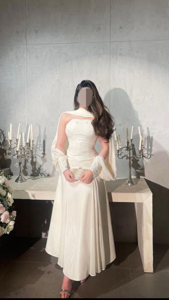 فستان سهرة طويل باللون البيج أجمل فساتين السعودية