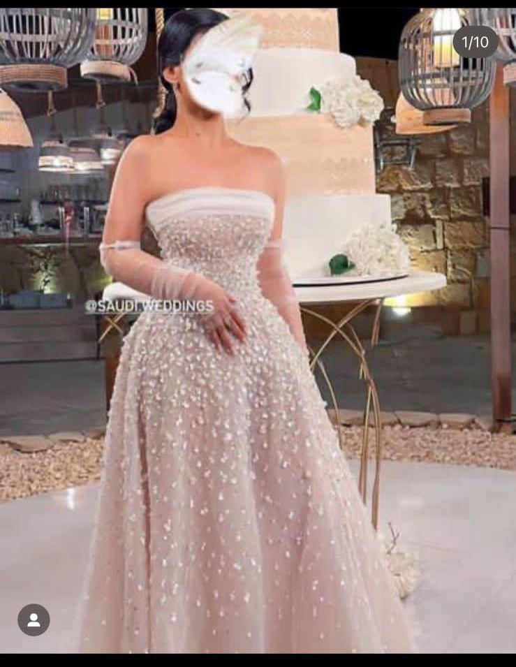 فستان سهرة فخم باللون البيج أجمل فساتين السعودية